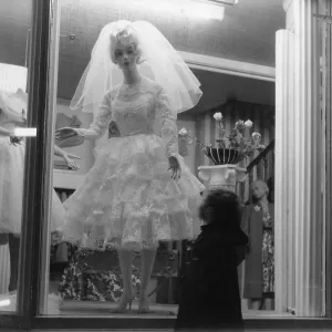 Shop window display with wedding dress Shop window display with wedding dress