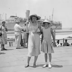 Two sisters at the docks in Port Said, Egypt Two sisters at the docks in Port Said, Egypt
