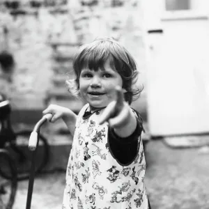 Toddler pointing and looking straight at the camera Toddler pointing and looking straight at the camera