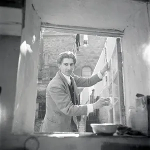 Unknown man at a window Unknown man at a window