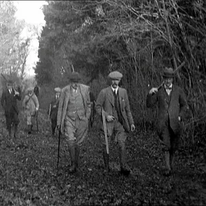 Upper Class British Men Walking Towards A Grouse Shoot