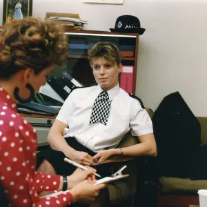 Woman police officer and colleague, London Woman police officer and colleague, London