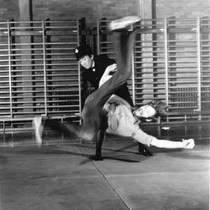 Woman police officer in self-defence training exercise Woman police officer in self-defence training exercise