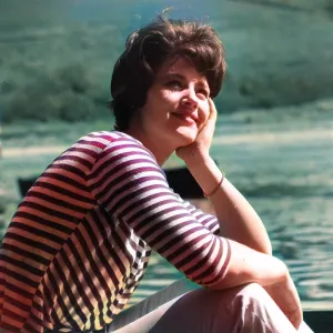 Woman relaxing in stripy top Woman relaxing in stripy top