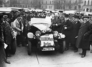 Becomes: The 100, 000th car in Berlin, 1930