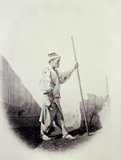 Beato: 1860's Japan - a pilgrim setting out for Mount Fujiyama