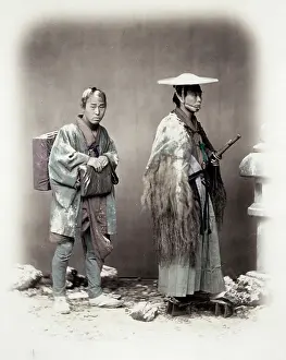 Beato: 1860's Japan - samurai and servant travelling in snow