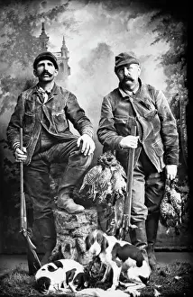 Shotguns: 1890s Two Men Hunters looking at Camera Posed with Brace