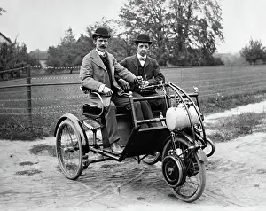 Horseless: 1900s TWO MEN IN BOWLER HATS SITTING IN THREE