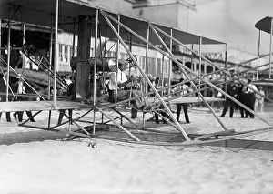 Wilber: 1900s pilot walter brookins sitting in wright