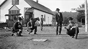 Hoss: 1910s MEN PLAYING MARBLES GAME OF HOSS IN ON