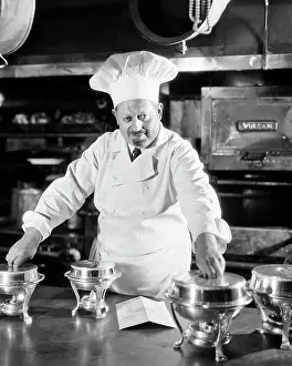 Chafing: 1920s 1930s Serious French Chef in Kitchen with Small Sil
