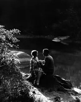 Tryst: 1920s 1930s Romantic Couple Sitting