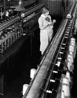 Spools: 1920s 1930s Woman Worker Threading