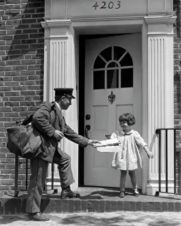 Mailman: 1920s Girl Getting Mail From Postman
