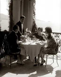 Brunch: 1920s Group Eating On Balcony