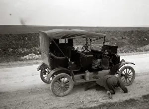 Unpaved: 1920s Man On His Hands And Knees