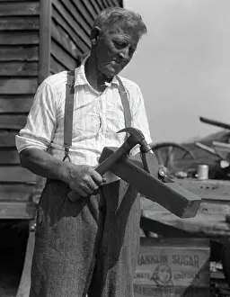 Clapboard: 1920s Old Wrinkled Face Man Standing