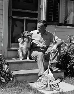1930s 1940s Man Sitting On Stairs