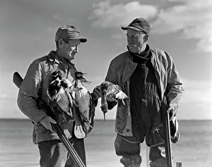 Shotguns: 1930s 1940s Two Men Duck Hunters