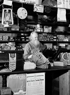 Countertop: 1930s Bearded Grocer Behind Counter
