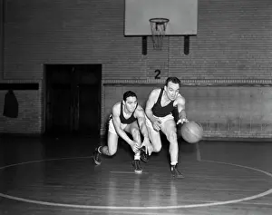 Dribbling: 1930s Two Boys Playing Basketball
