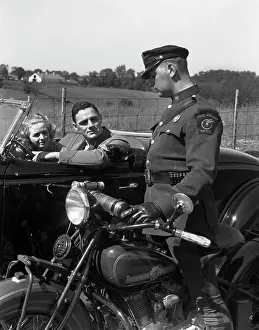 Violation: 1930s Couple In Convertible Coupe