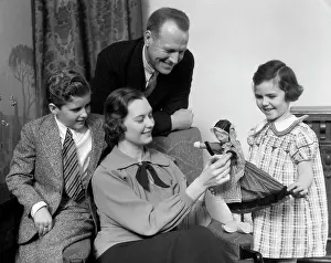Clog: 1930s Family Of Four Gathered