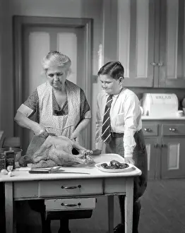 Grandmothers: 1930s Grandmother In Apron Preparing