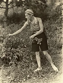 Chic: 1930s lady picking brambles