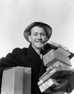 Armful: 1930s Man Cigar In Mouth Hat Carrying