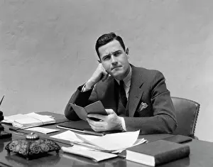 Passbook: 1930s Man At Desk In Office With