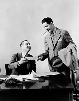 1930s Two Men At Desk In Office