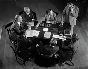 Boardroom: 1930s Six Men And One Woman Sitting