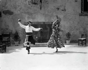 Castanets: 1930s Smiling Couple Dressed In