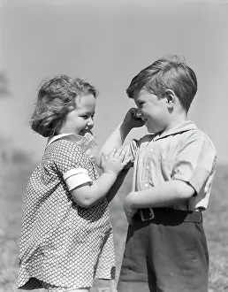 Bicep: 1930s Smiling Girl Dressed In