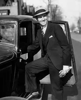 Gloved: 1930s Smiling Man In Suit And