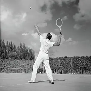 Aerobics: 1930s Back View Of Man Playing