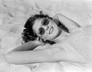 Sunning: 1930s Woman In Sunglasses Lying