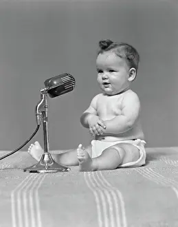 Diapers: 1940s BABY IN DIAPER WITH MICROPHONE STUDIO