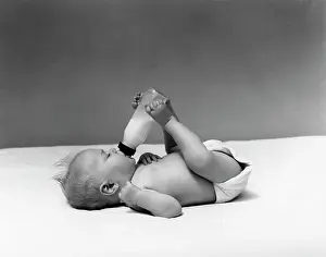 Diaper: 1940s Baby Prone Drinking From