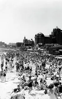 Taffy: 1940s Beach Crowd Of Sunbathers