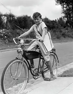 Newsprint: 1940s Boy On An Elgin Bike Carrying