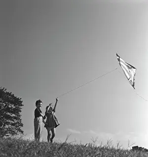 Egx001: 1940s Boy And Girl On Hillside