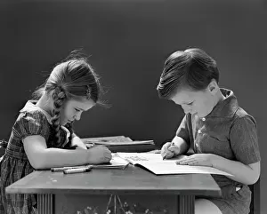 Coloring: 1940s Children Coloring In Book Sitting At Table