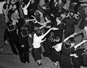 Conflicting: 1940s Crowd Group Men Women Dancing