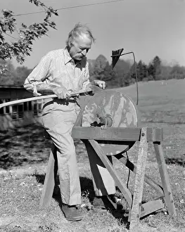 Grindstone: 1940s Elderly Man Seated At Grindstone