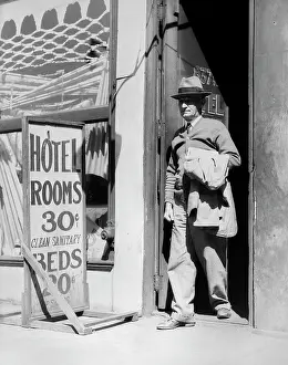 Indigent: 1940s Elderly Man Walking Out