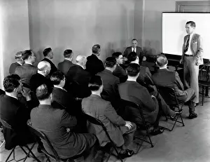 Banging: 1940s Executives In Rows Of Folding