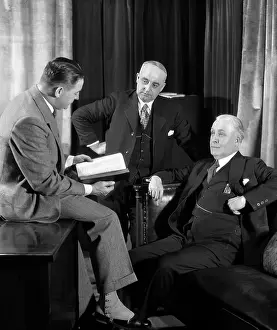 Businesspeople: 1940s Group Of Three Businessmen